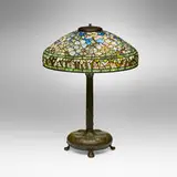Dogwood table lamp by Tiffany Studios, c. 1910, leaded glass, patinated bronze, sold Oct 2024