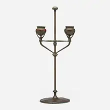 Adjustable two-light candlestick by Tiffany Studios, c. 1910, patinated bronze, sold Oct 2024