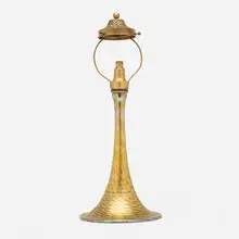 Table lamp base by Tiffany Studios, c. 1910, hand-blown Favrile glass, acid-etched and gilt bronze, sold Oct 2024