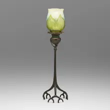 Root candlestick with pulled-feather shade by Tiffany Studios, c. 1910, patinated bronze, hand-blown Favrile glass, sold Oct 2024