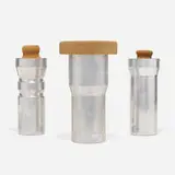 Peter Schlumbohm, Fahrenheitor cocktail shakers, set of three, 1943, spun aluminum, cork