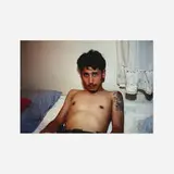 Kee in Bed, East Hampton, N.Y. by Nan Goldin, 1996, c-print, sold Nov 2020
