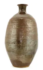 David Leach (1911-2005) by David Leach, a tall iron-glazed stoneware bottle vase, sold Jul 2021