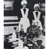 Parlourmaid and Under-Parlourmaid Ready to Serve Dinner by Bill Brandt, Gelatin Silver Print, offered Dec 2025