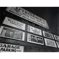 Berenice Abbott, Advertisements, East Houston Street and Second Ave, 1982, Gelatin silver print mounted on board