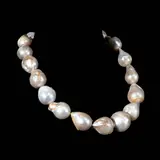 A Classic Baroque Pearl Necklace, Untitled, Featuring baroque pearls that graduate in size from 15mm to 20mm and held by a copper lock, the necklace offers an organic silhouette when worn. <br> The necklace length is 16 inches. <br> Weighs 26.60 grams
