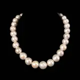 A Classic Pearl Necklace, Untitled, This necklace features pearls in graduating sizes, ranging from 12mm to 14mm held by a copper lock. <br> The necklace length is 16 inches. <br> Weighs 96.90 grams.