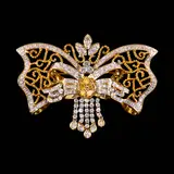 Untitled by A Ribbon Brooch in Two-toned 14k, A Ribbon Brooch in Two-toned 14k The ribbon brooch in two-toned 14k yellow and white gold features fancy yellow diamonds, offered Apr 2026