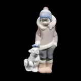 A Lladrò, Eskimo Boy with pet / Inuit Boy with Polar Bear Cub