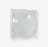 Ohne Titel by Adolf Luther, 1975, Halbtransparente, konkave Linse vor Spiegel. Auf Holz montiert, sold Jun 2025