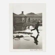 Behind the Gare St. Lazare by Henri Cartier-Bresson, gelatin silver print, sold Oct 2024