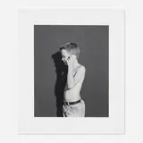 Collier Schorr, Boy with Shell, 2005, gelatin silver print flush-mounted to board