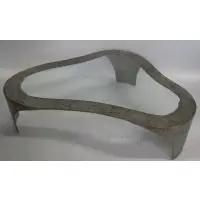 Silas Seandel, (American B. 1937) Signed "Doumo", 1937, Textured and patinated bronze and pewter wash with Glass center