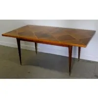for Charak Modern Dining Table by Tommi Parzinger, Midcentury parquetry inlaid with fluted legs and brass capped feet, offered May 2016
