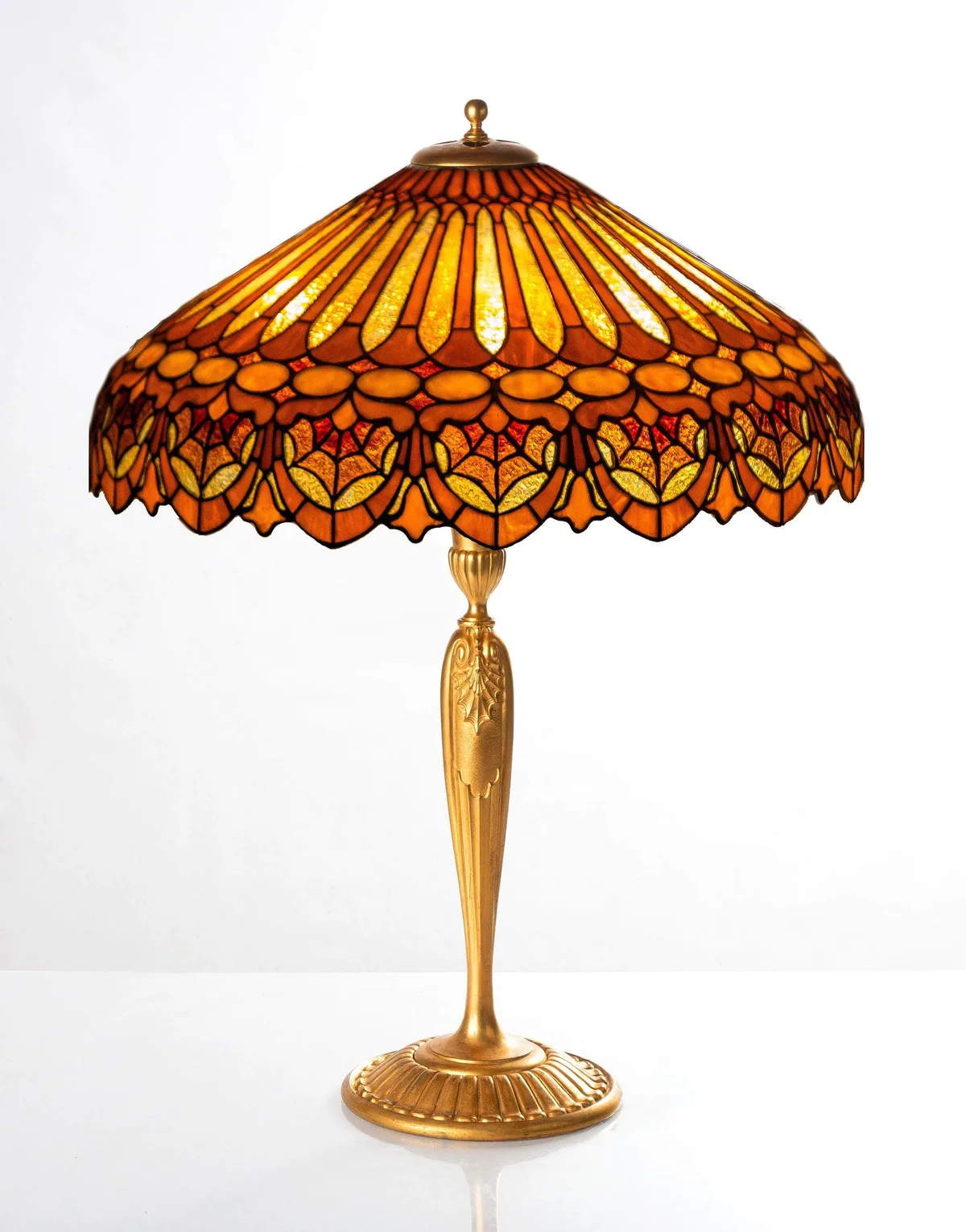 Spider Web Table Lamp by Duffner & Kimberly, 1910, Leaded glass shade with an ormolu bronze base, sold Nov 2023