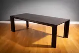 Lomi Design, A Large Darkwood Dining Table