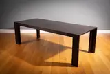 Lomi Design, A Large Darkwood Dining Table