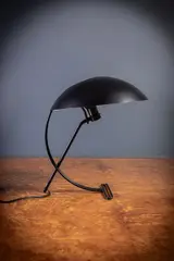 A Nb100 Desk Lamp by Louis Christiaan Kalff, offered Apr 2024