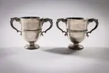John Moore, A Pair Of 2 Irish Silver Two Handled Trophy Cups