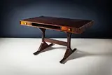 A Rosewood Model 530 Desk by Gianfranco Frattini, offered Apr 2025