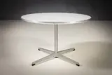 A Circular Occassional Table by Arne Jacobsen, offered Apr 2026