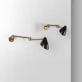 Angelo Lelii, A pair of wall lamps, 1953, Brass structures with triple joint,
