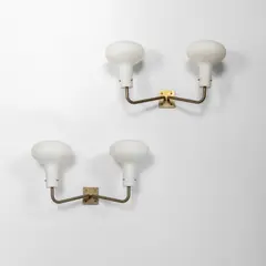 A pair of 'Lp 12 ' wall lamps by Ignazio Gardella, 1959, Brass, frosted opaline glass, sold Apr 2026
