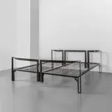 Tobia Scarpa, A 'Vanessa' bed, 1959, Varnished steel