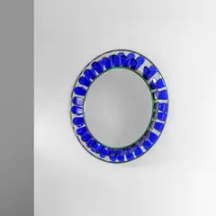 A wall mirror by Max Ingrand, 1964, Curved crystal, coloured crystals, mirrored crystal, offered Apr 2026