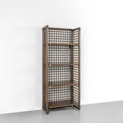 A. & T. Scarpa, A bookcase, 1975, Rattan, rush, leather, brass, shelves veneered in exotic wood