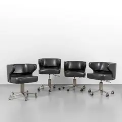 Giulio Moscatelli, Four armchairs on wheels 'Poney' model, 1970s, Satin-finished steel, vinyl upholstery, height adjustable with gas piston