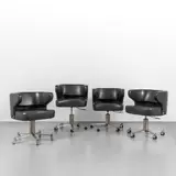 Giulio Moscatelli, Four armchairs on wheels 'Poney' model, 1970s, Satin-finished steel, vinyl upholstery, height adjustable with gas piston