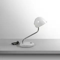 A 'Elmo' table lamp by Joe Colombo, 1971, Enamelled aluminum and chrome-plated steel, offered Apr 2026