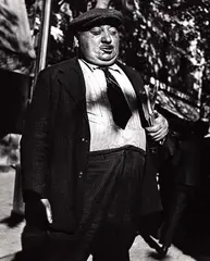 Lisette Model, Man with pamphlets, Paris 1933–38, 1933, photograph