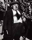 Lisette Model, Man with pamphlets, Paris 1933–38, 1933, photograph