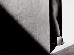 Sam Haskins, Apple on sill with diagonal shadow, 1980, photograph