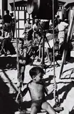 Burt Glinn, Liz Taylor and her kids during a break on set, Spain 1959