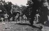 Krys Taconis, Front Liberation Nationale soldiers run for cover, Algeria 1957, 1957, photograph