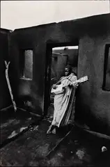 Ian Berry, A house burnt down during a political raid, Maseru, Lesotho 1961, 1961, photograph