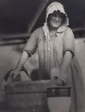 Doris Ulmann, Mountain woman washing cream pot, Sylva, N.C., 1924, photograph