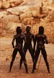 Leni Riefenstahl, Three Kau Nuba girls dancing the 'Njertun', Kordofan, Sudan 1975