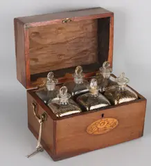 19e eeuw by Likeur keldertje, 19e Eeuwse likeurkelder van mahoniehout met intarsia + zes karaffen met goud decor, offered Jan 2018
