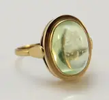 groene steen by Ring Gg 585 & 000 met licht groene steen, Fijne ring met ovaal cabouchon geslepen licht groene steen, iets beschadigd,14x11. ca 5 gr. ø 54, offered Jan 2014