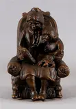 Brondkleurige figuur, oma, Bronskleurige figuur, oma met kleinzoon aan het voorlezen. gesigneerd Mat Wanders