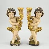 2x Houten putti, H 35 cm.