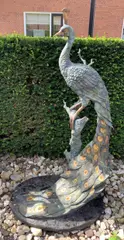 Groot bronzen beeld, Pauw