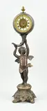 1900 by Antiek Franse compositie metalen kogelpendule met putti, offered Apr 2025