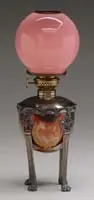 Junior Banquet Lamp by Pairpoint, Pink cased ball shade on a silver-plated metal base with drop-in font, sold Dec 2006