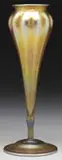 Tiffany Studios, Flower Form Vase, Deeply ribbed favrile glass vase rests atop an inverted saucer foot