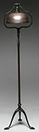 Floor Lamp by Tiffany Studios, Base houses a bronze domed shade with impressed linear band above the lip, offered Jun 2014